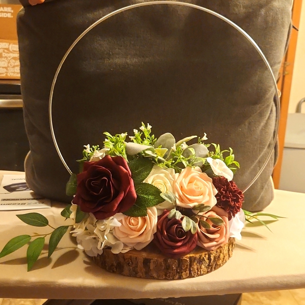 Floral centerpiece with silver hoop